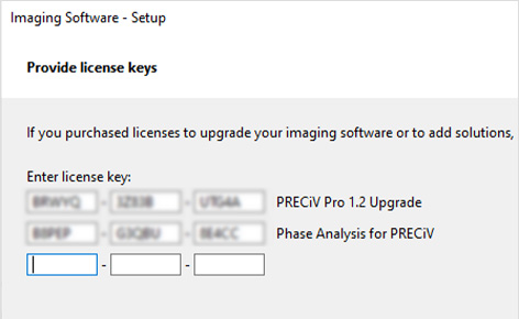 a pak zadejte své OTM licenční klíče pro software PRECiV. Klikněte na „Next“ (Další).
