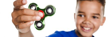 Boy with spinner toy